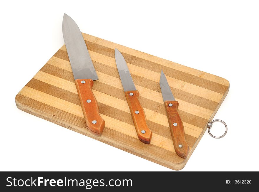 Kitchen knifes on board