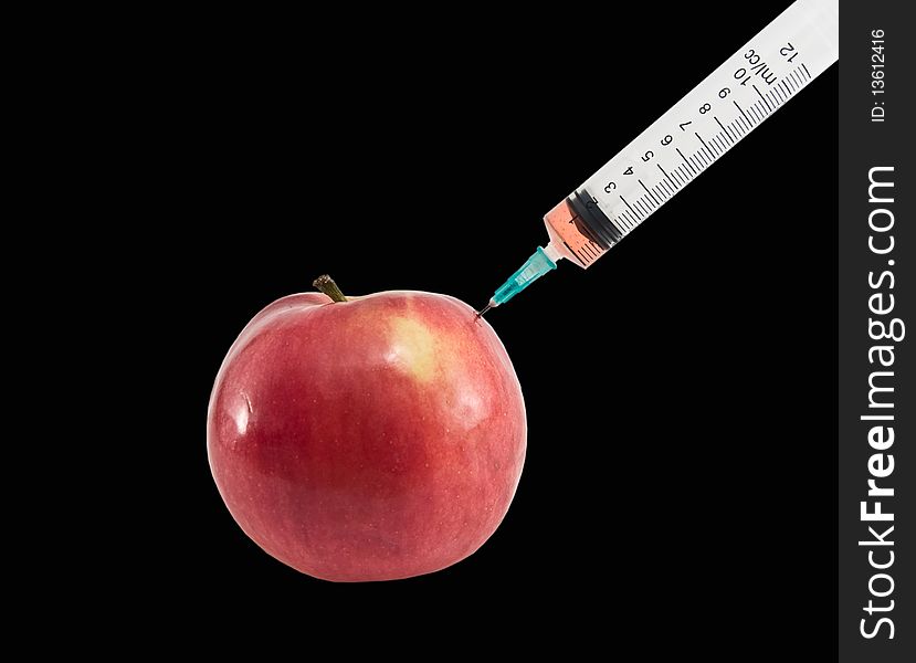 Apple and syringe.