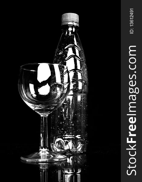 Bottle and glass. black and white