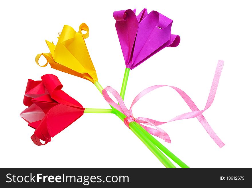 Bouquet of paper flowers made by a child for her mother, isolated on a white background.