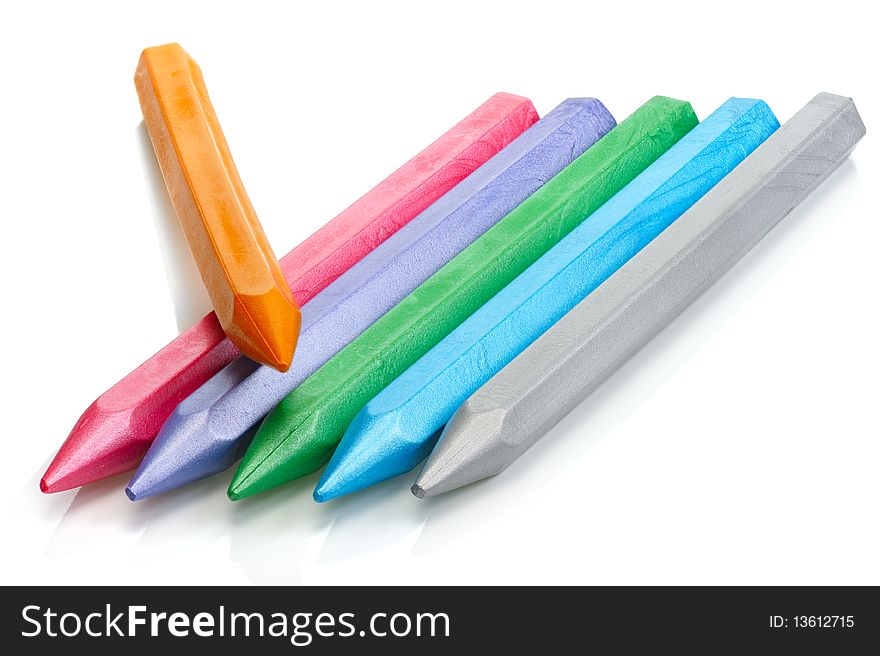 Pearl wax crayons on a white background, isolated. Pearl wax crayons on a white background, isolated.