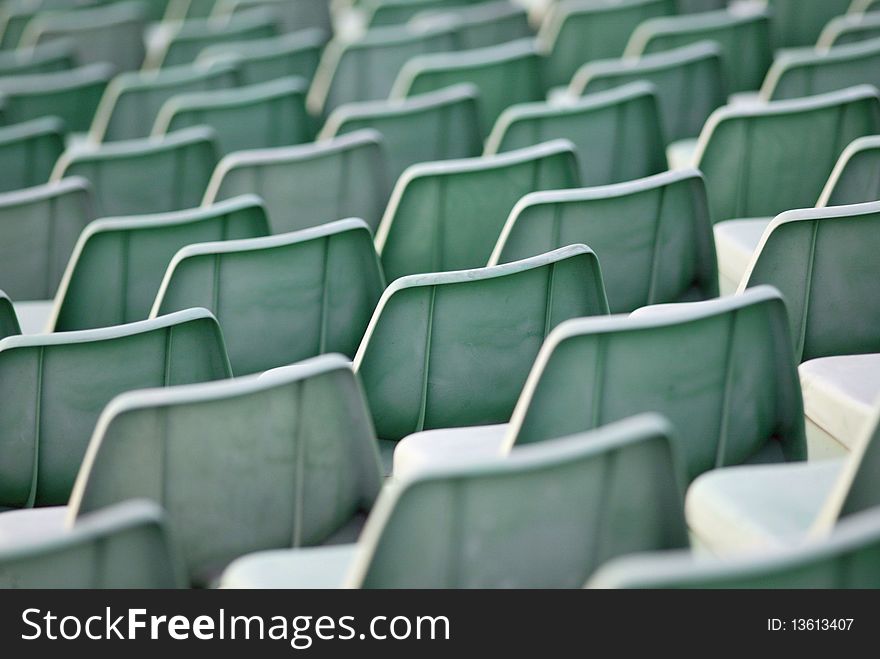 Green seats in a stadium