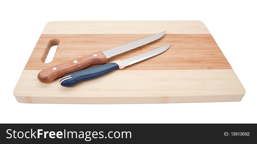 Two knifes with wooden handle over cutting board, isolated on white background. Two knifes with wooden handle over cutting board, isolated on white background