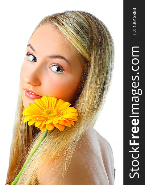 Young woman with a flower. Over white background