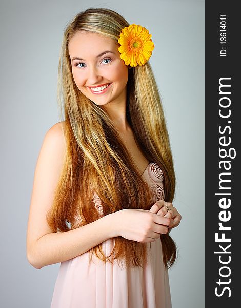 Beautiful young girl posing in studio