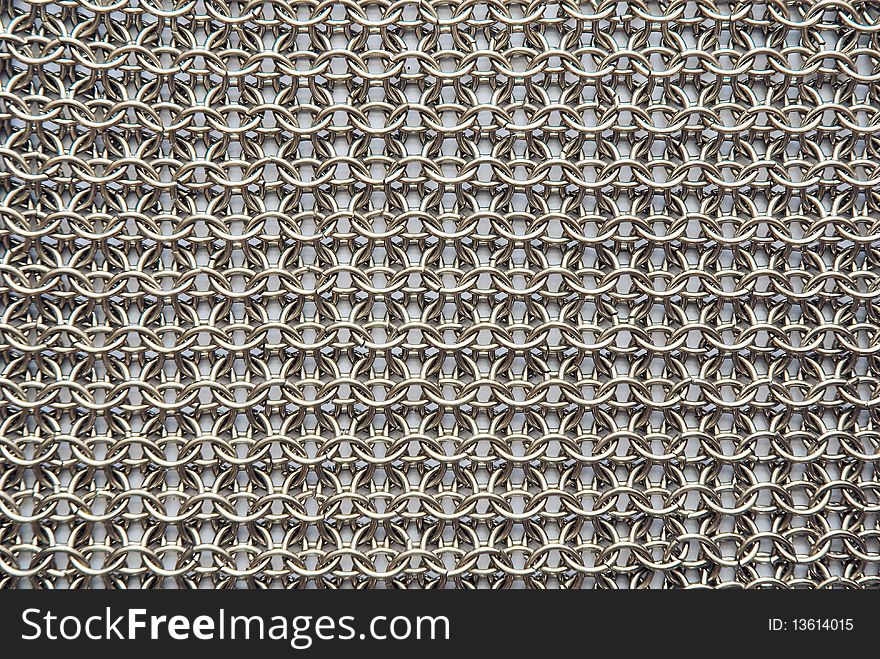 Chain armour on a white background. Abstract texture. Chain armour on a white background. Abstract texture.