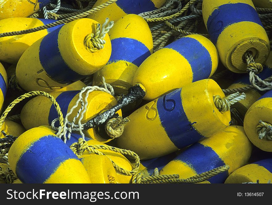 Colorful rope and crab trap buoys on a wharf