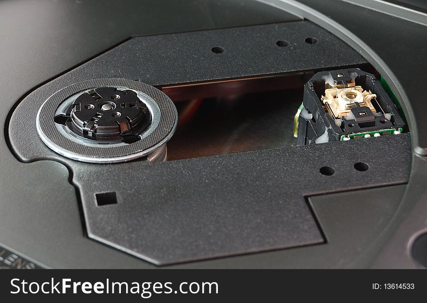 Closeup view of laser system of portable dvd player