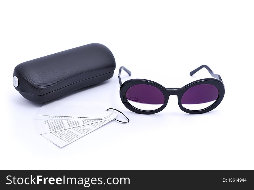 Sunglasses with a case on a white background
