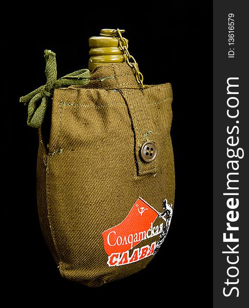 Soldiers flask on a black background. Soldiers flask on a black background