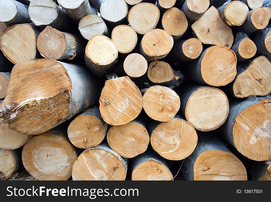 Deforestation area with pile of logs, texture or background. Deforestation area with pile of logs, texture or background.