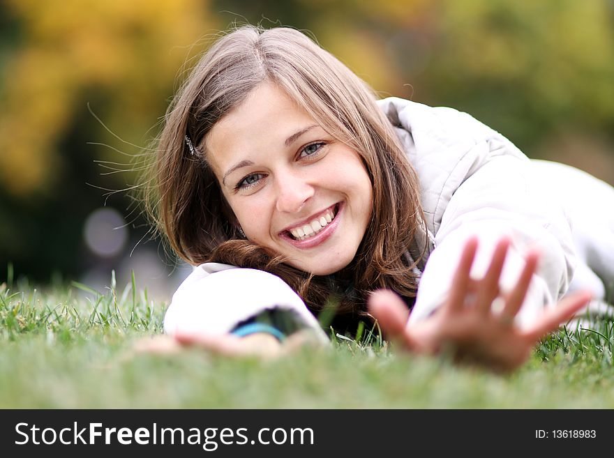 Woman relaxing in the grass
