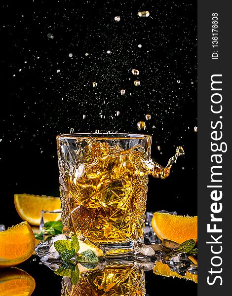 Elite alcoholic drink closeup. Two cognac portions in glass on black background, menu photo, copy space.