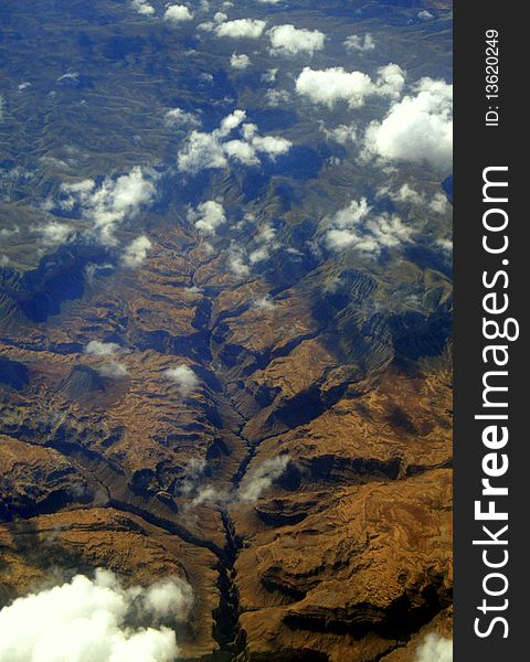 Aerial view of the branching canyon tributaries leading to the Colorado River at Grand Canyon National Park in southern Arizona. Aerial view of the branching canyon tributaries leading to the Colorado River at Grand Canyon National Park in southern Arizona.