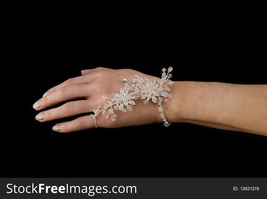 Elegant bracelet on a hand of the girl