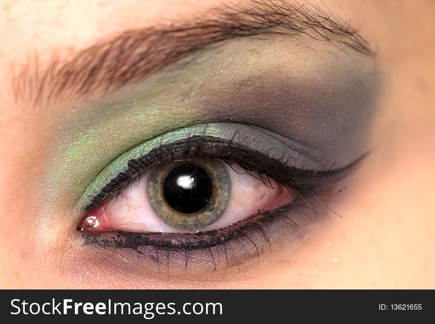 Beautiful woman green eye with make up