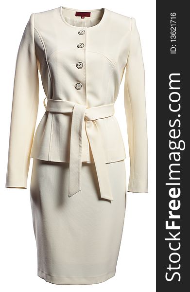 Beige jacket and skirt on a white