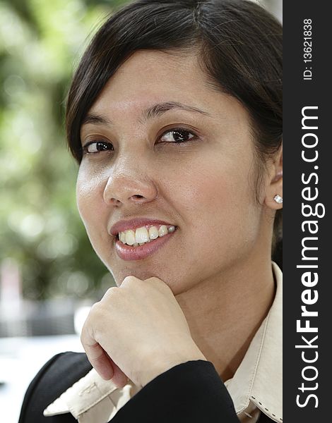 Portrait shot of an Asian businesswoman smiling