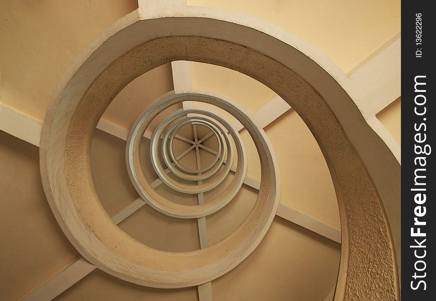 An abstract shot of a spiral staircase
