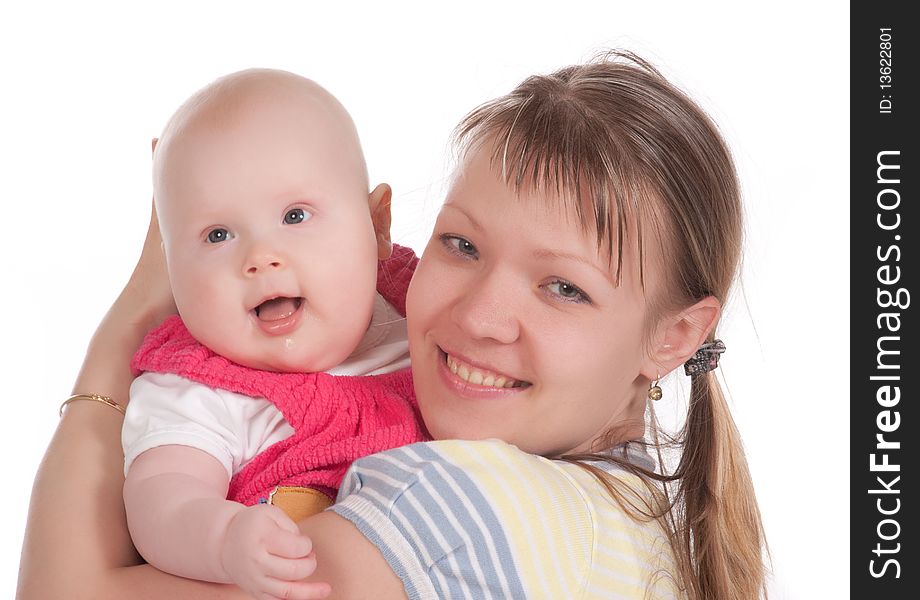 Happy mother with baby over white background. Cute little baby embrace her mother