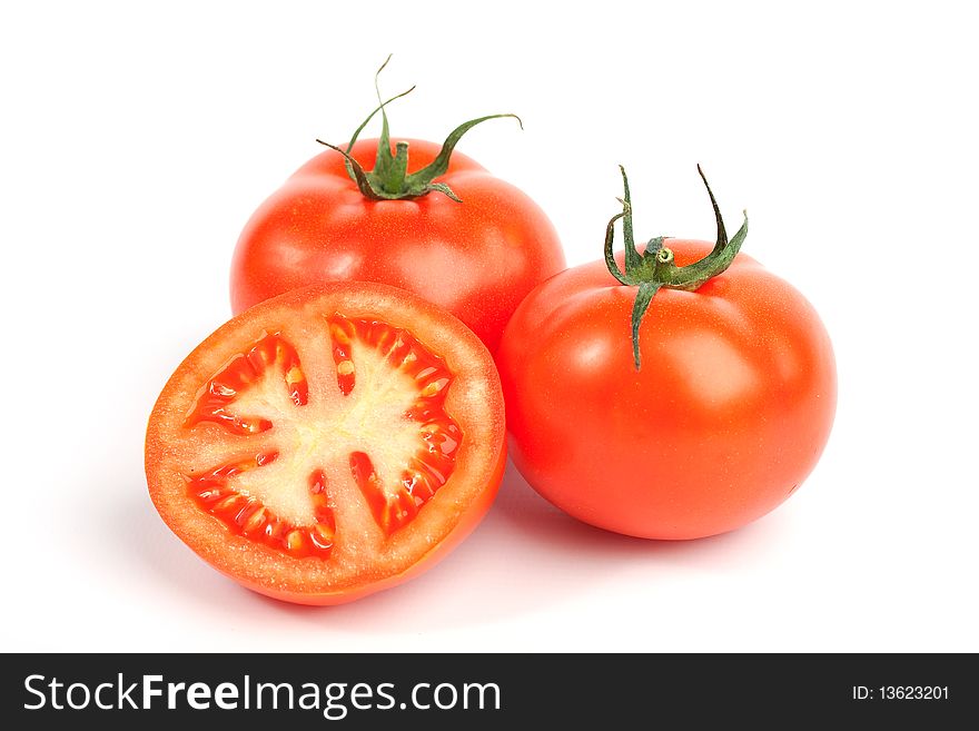 Red tomato vegetables with cut isolated on white background