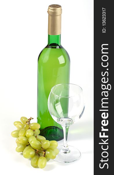 Glass, Bottle And Grapes