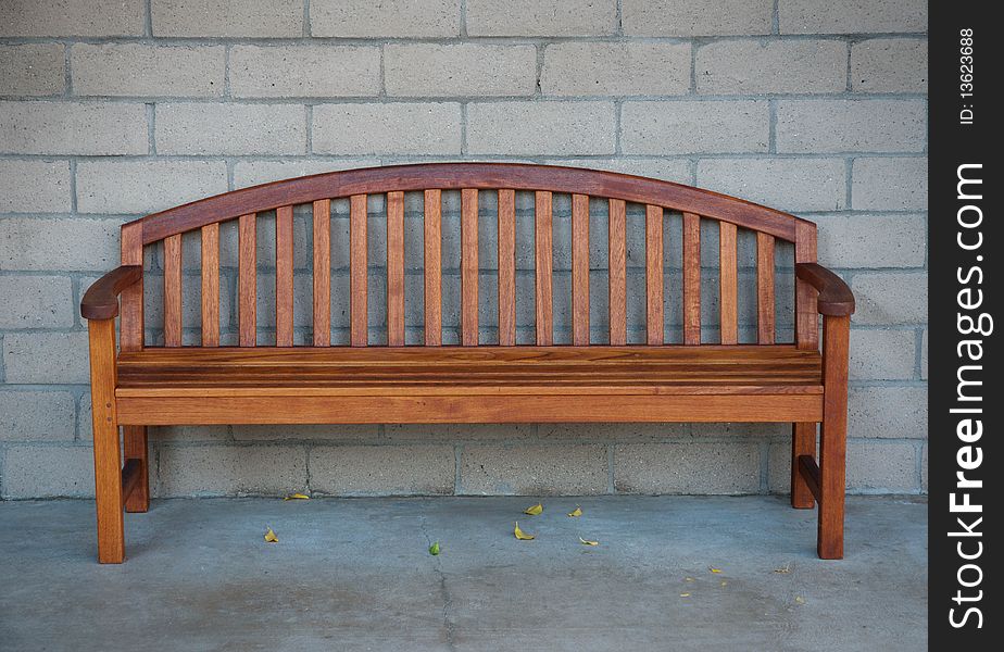 A park bench on stone background