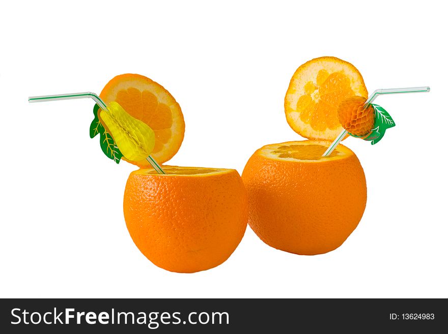 Two Large Ripe Orange With Tubes For A Cocktail