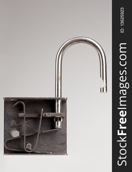 Closeup of an open padlock, isolated on white.