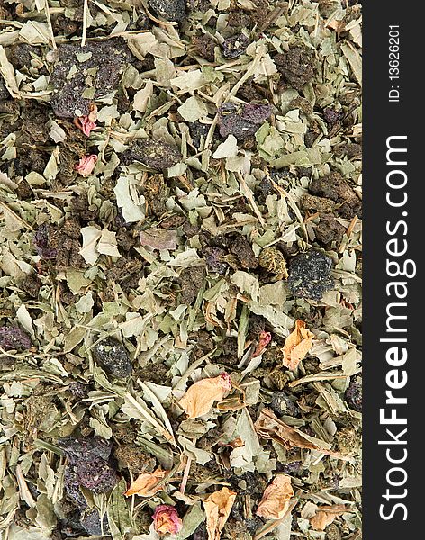 Background of dried flowers and tea leaves. Background of dried flowers and tea leaves