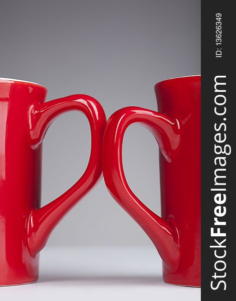 Red handle cups, representing the two halves of the heart