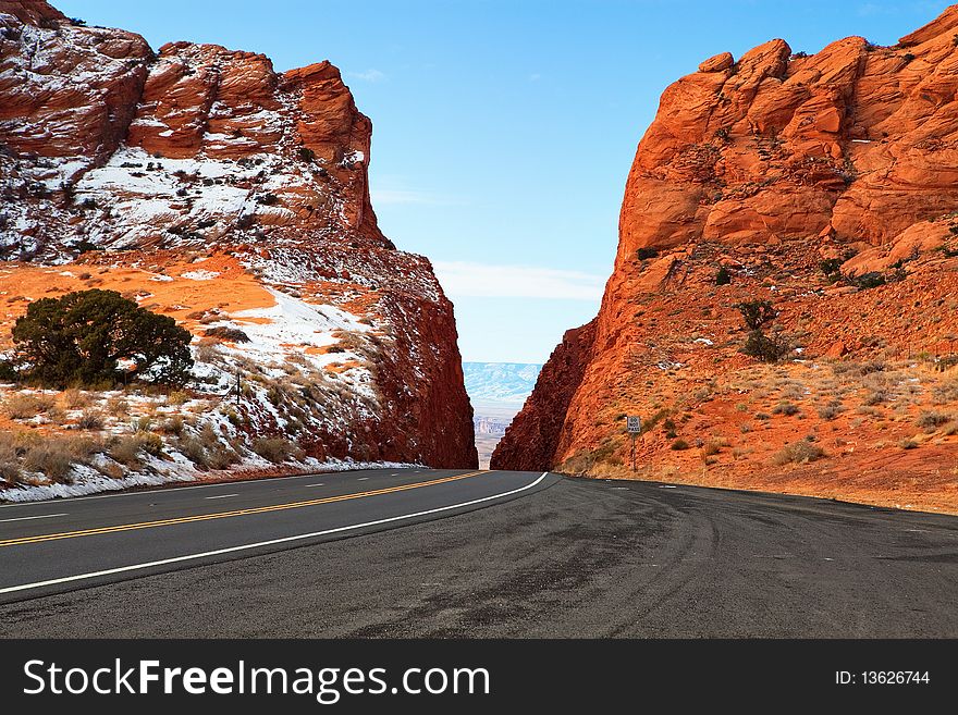 Asphalt road between the mountains in Utah. Asphalt road between the mountains in Utah