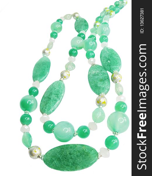 Green avanturine mineral beads isolated on white background. Green avanturine mineral beads isolated on white background