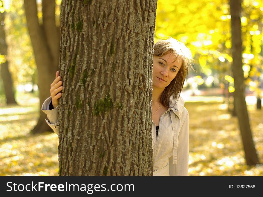 Pretty woman in an autumn park