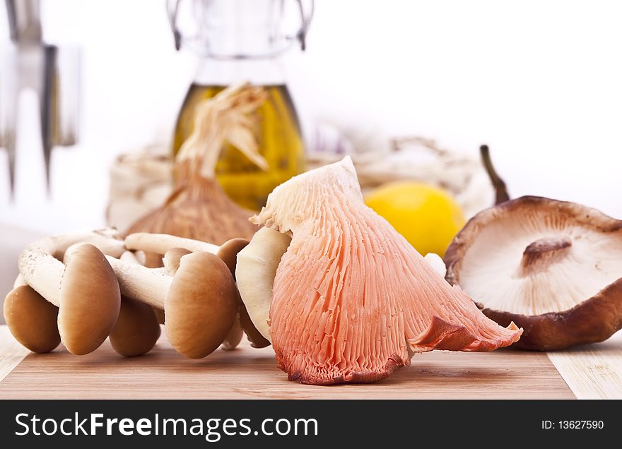 Exotic mushrooms on a wooden cutting board