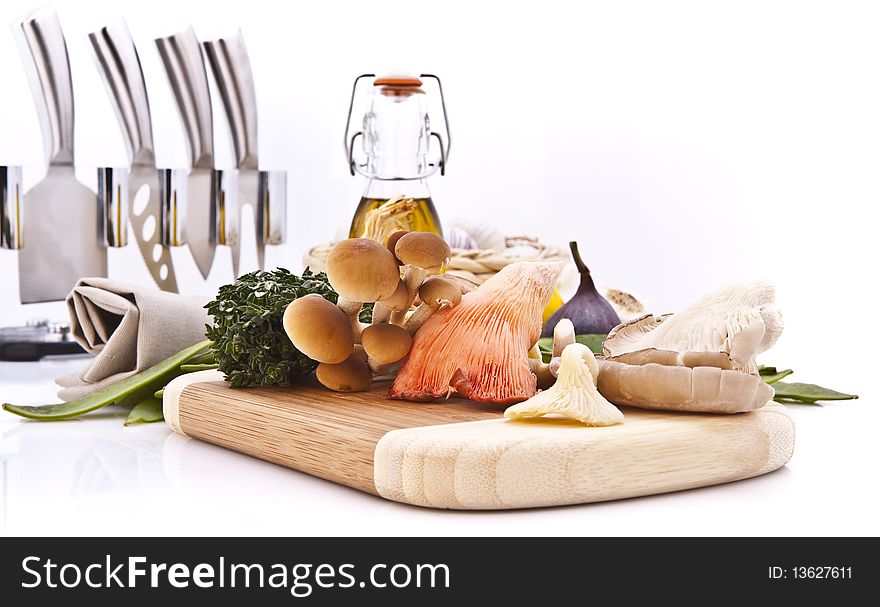 Exotic mushrooms on a wooden cutting board