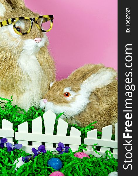 Cute bunnies with Easter eggs. Cute bunnies with Easter eggs.