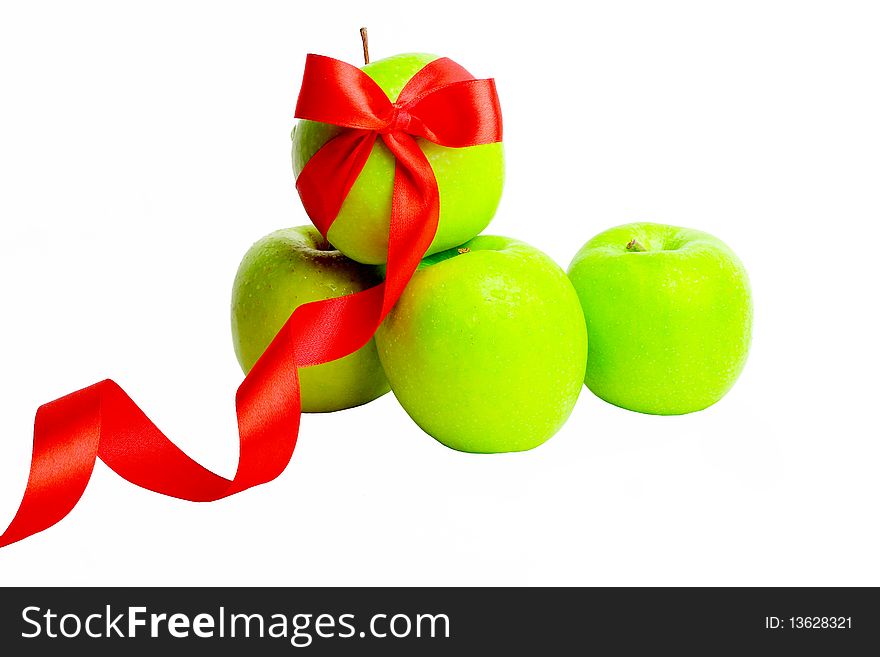 The green apple is decorated red by a tape