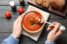 Woman Eating Fresh Homemade Tomato Soup At Wooden Table Stock Images