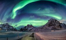 Northern Lights Explosion On Snowy Mountain Range Stock Image Northern Lights Explosion On Snowy Mountain Range Stock Image