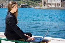 Woman With Laptop Near The Sea Stock Photo Woman With Laptop Near The Sea Stock Photo