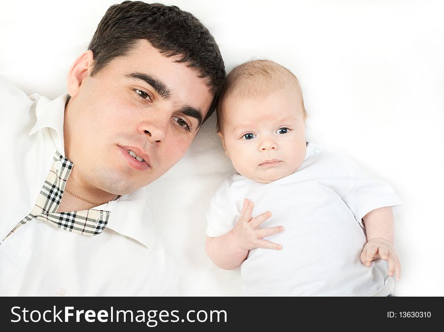 Happy family home: father playing with his little baby. Happy family home: father playing with his little baby