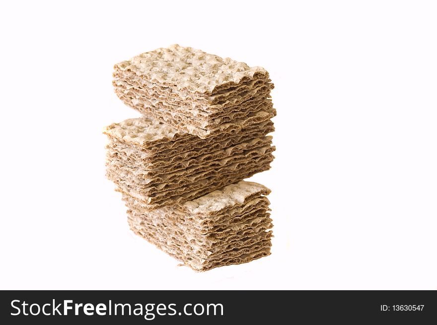 Stack of crackers isolated on a white background