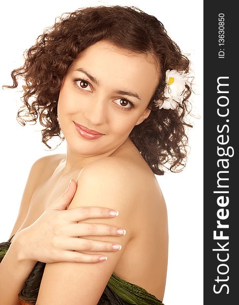 Beautiful woman with camomile flower on white background