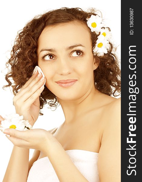 Beautiful woman  with camomile flower on white background. Beautiful woman  with camomile flower on white background