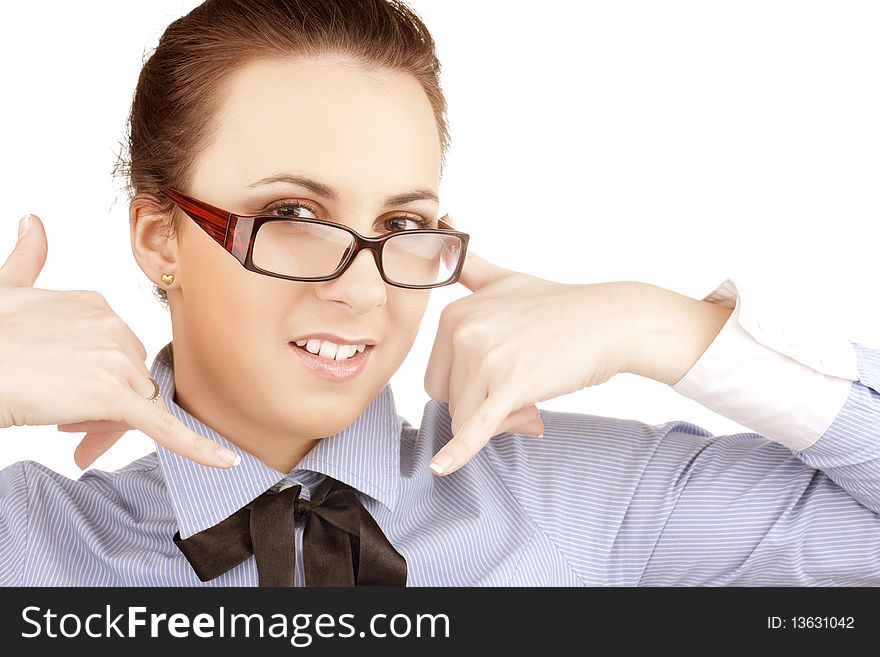 Beautiful young girl shows gestures two telephones. Beautiful young girl shows gestures two telephones