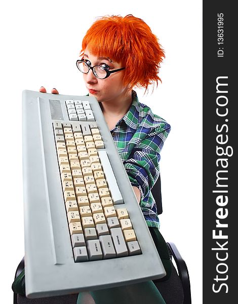 Girl with an old keyboard on a white background