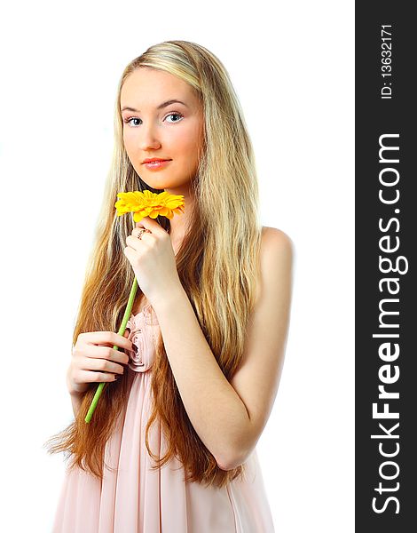 Young woman with a flower. Over white background