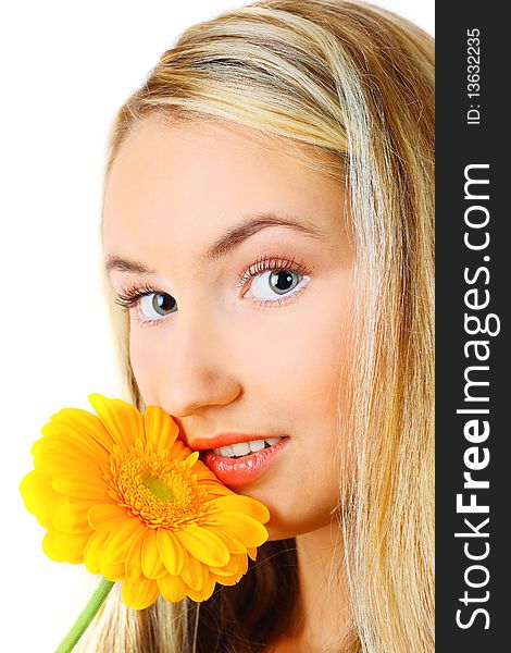 Sensual portrait of beautiful young blond woman with flower. Isolated on white background. Sensual portrait of beautiful young blond woman with flower. Isolated on white background