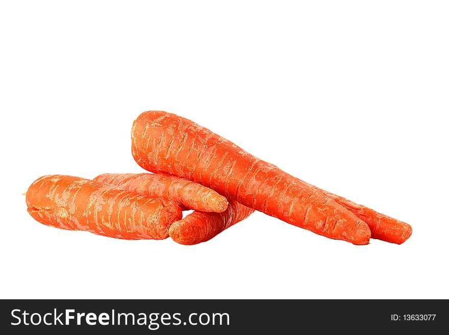 Some the big carrots on a white background.